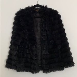 Black shaggy light jacket.